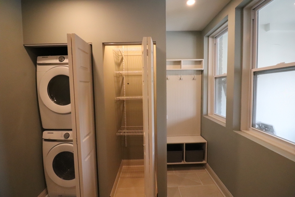 1446 West Irving Park Road, Unit 2 Chicago, IL 60613 - Photo 20 of 23 a bathroom with a washer and dryer