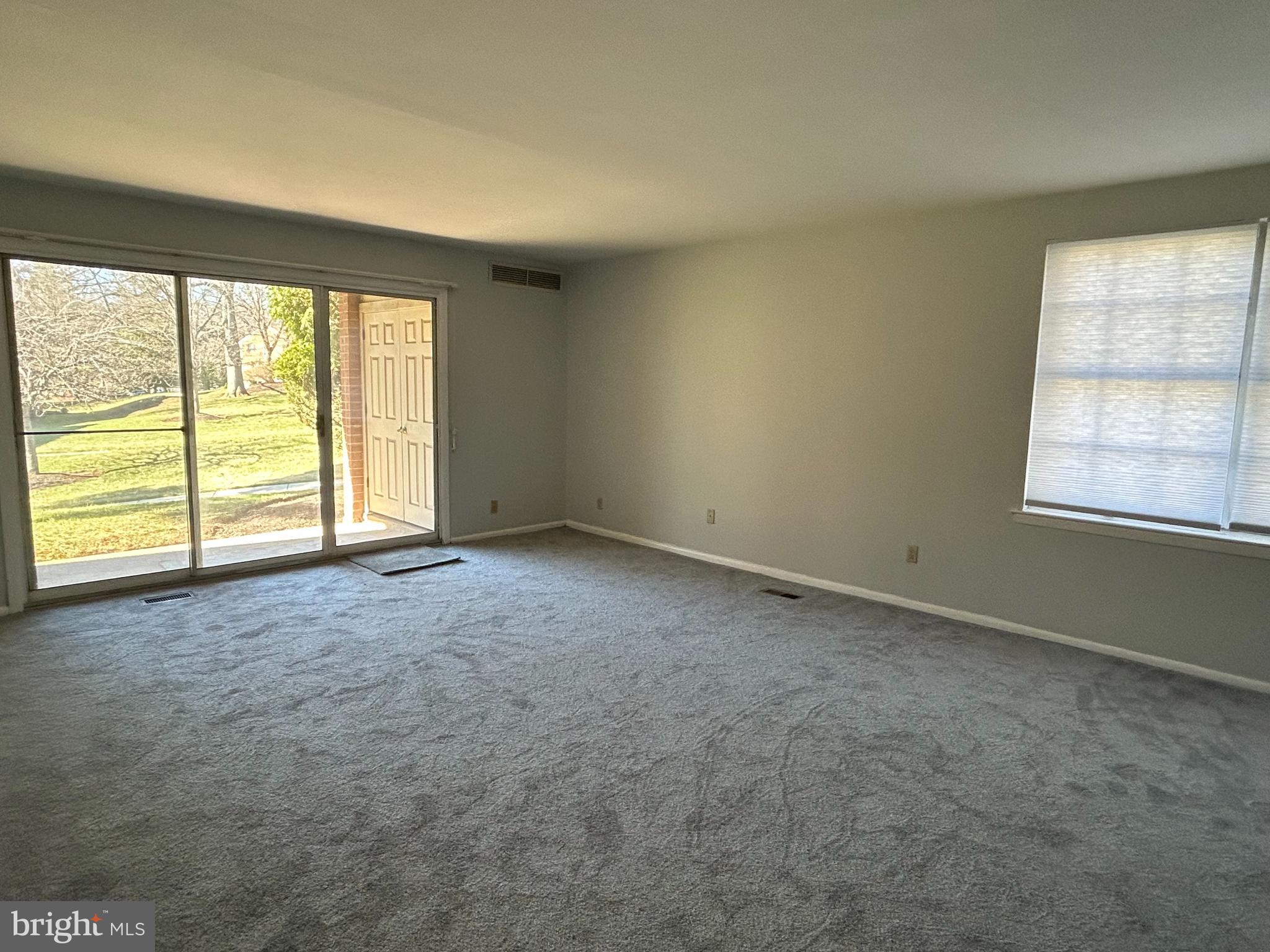 115 Drummers Lane Wayne, PA 19087 - Photo 3 of 11 an empty room with windows