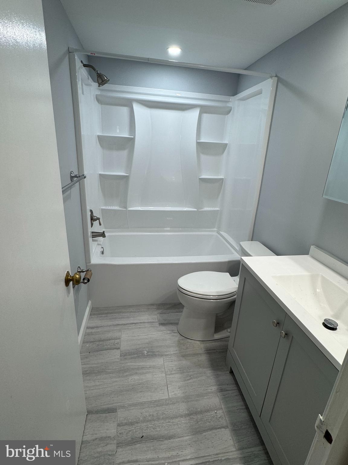 115 Drummers Lane Wayne, PA 19087 - Photo 10 of 11 a bathroom with a sink a toilet and shower