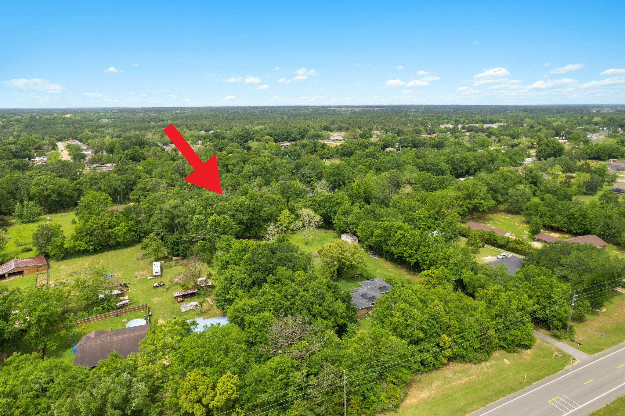 2751 Pine Forest Road Cantonment, FL 32533 - Photo 5 of 13 a view of an outdoor space and a yard