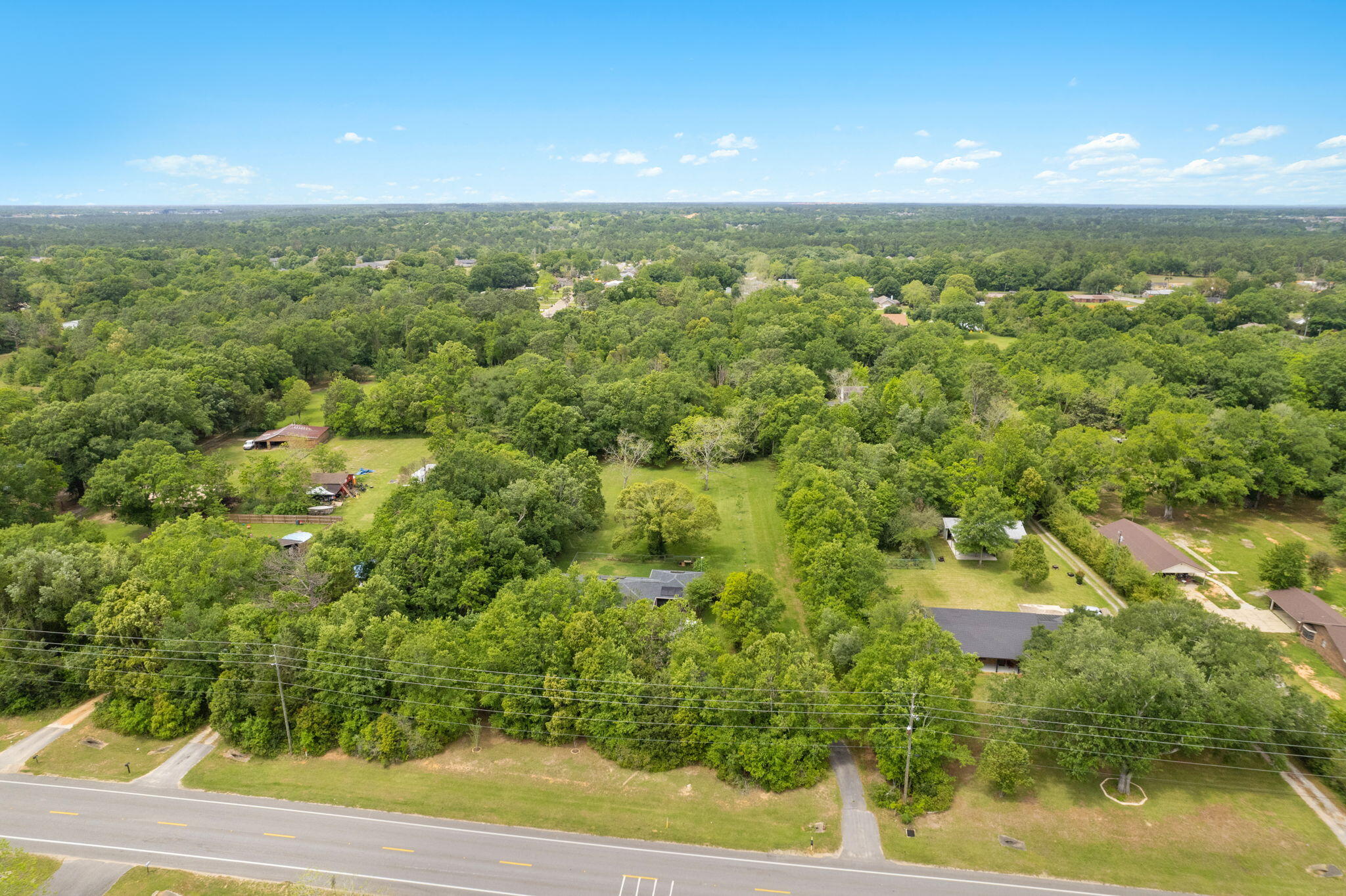 2751 Pine Forest Road Cantonment, FL 32533 - Photo 9 of 13 a view of a city from a yard