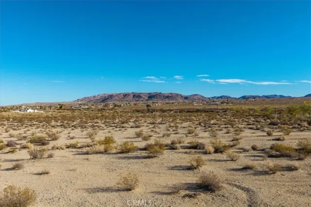 a view of a lake with mountain