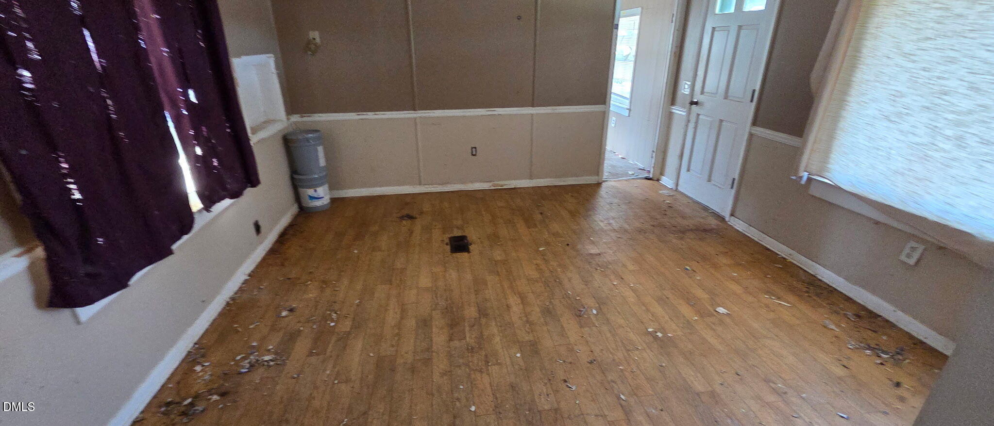 484 Yellow Skin Road Autryville, NC 28318 - Photo 9 of 24 wooden floor in an empty room with a window