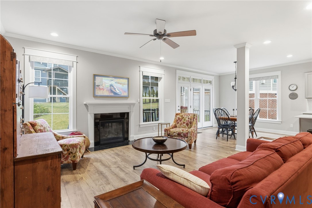 4001 Bircham Loop Midlothian, VA 23113 - Photo 14 of 33 a living room with furniture a fireplace and a large window