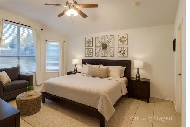 a bedroom with a bed and couch