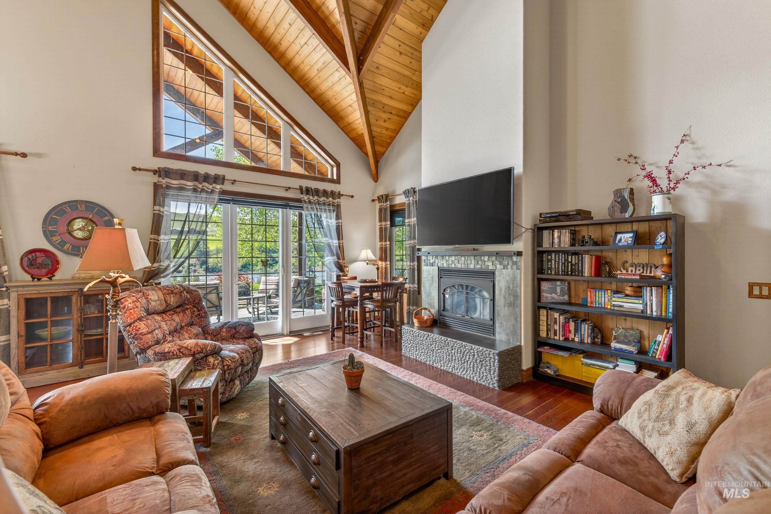 113 Deford Road White Bird, ID 83554 - Photo 16 of 49 Soaring vaulted ceiling with wood paneling