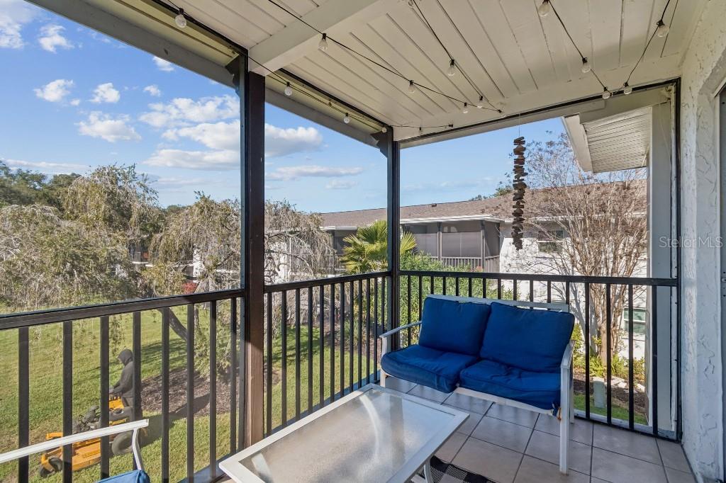 13125 Wilcox Road, Unit 6205 Largo, FL 33774 - Photo 34 of 48 a view of a city from a balcony with furniture