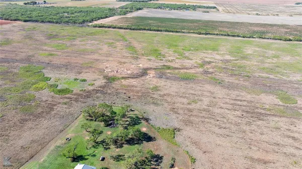a view of a lake from a yard