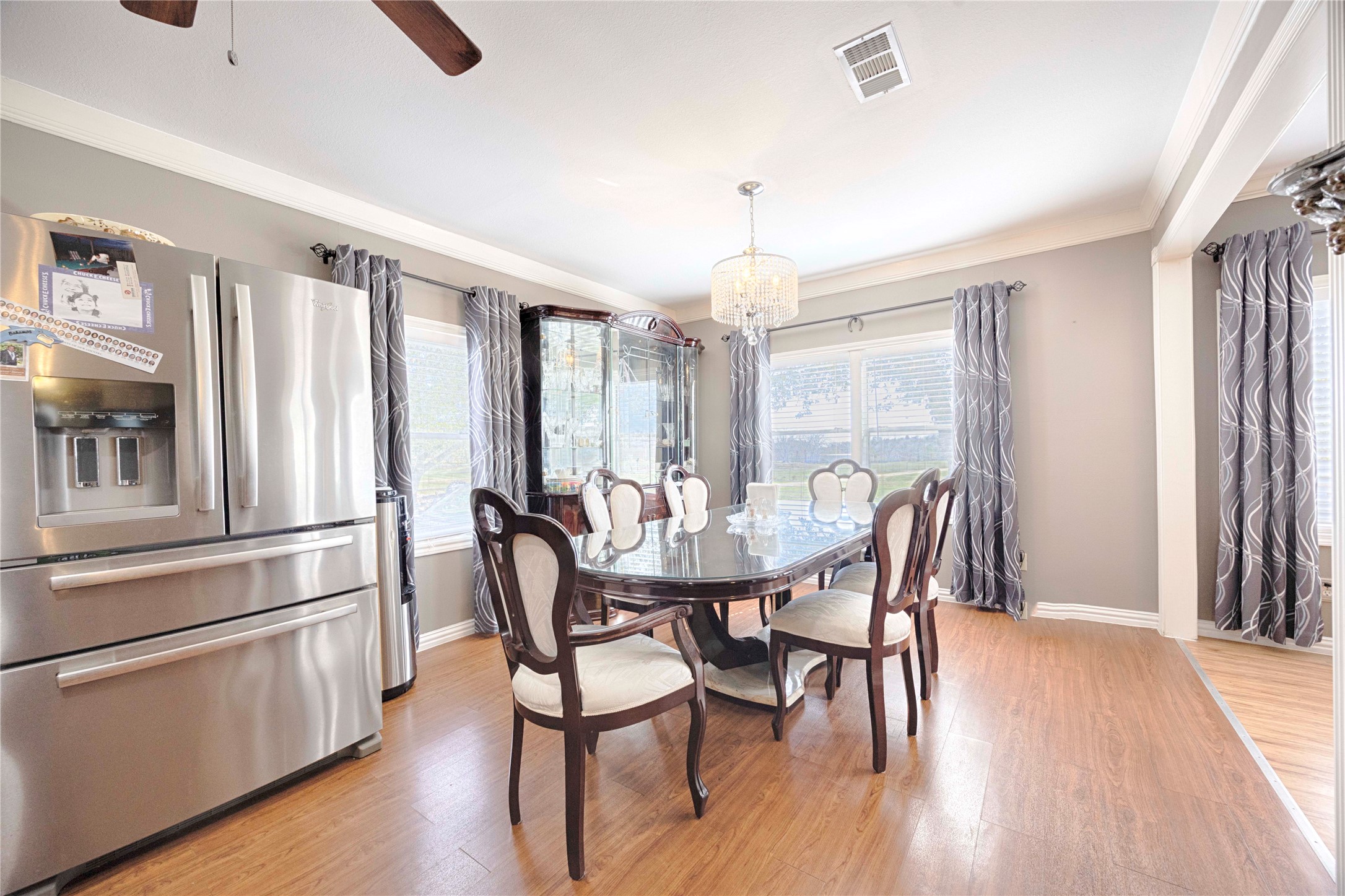 5135 Highway 90 Schulenburg, TX 78956 - Photo 12 of 32 a view of a dining room with furniture window and wooden floor