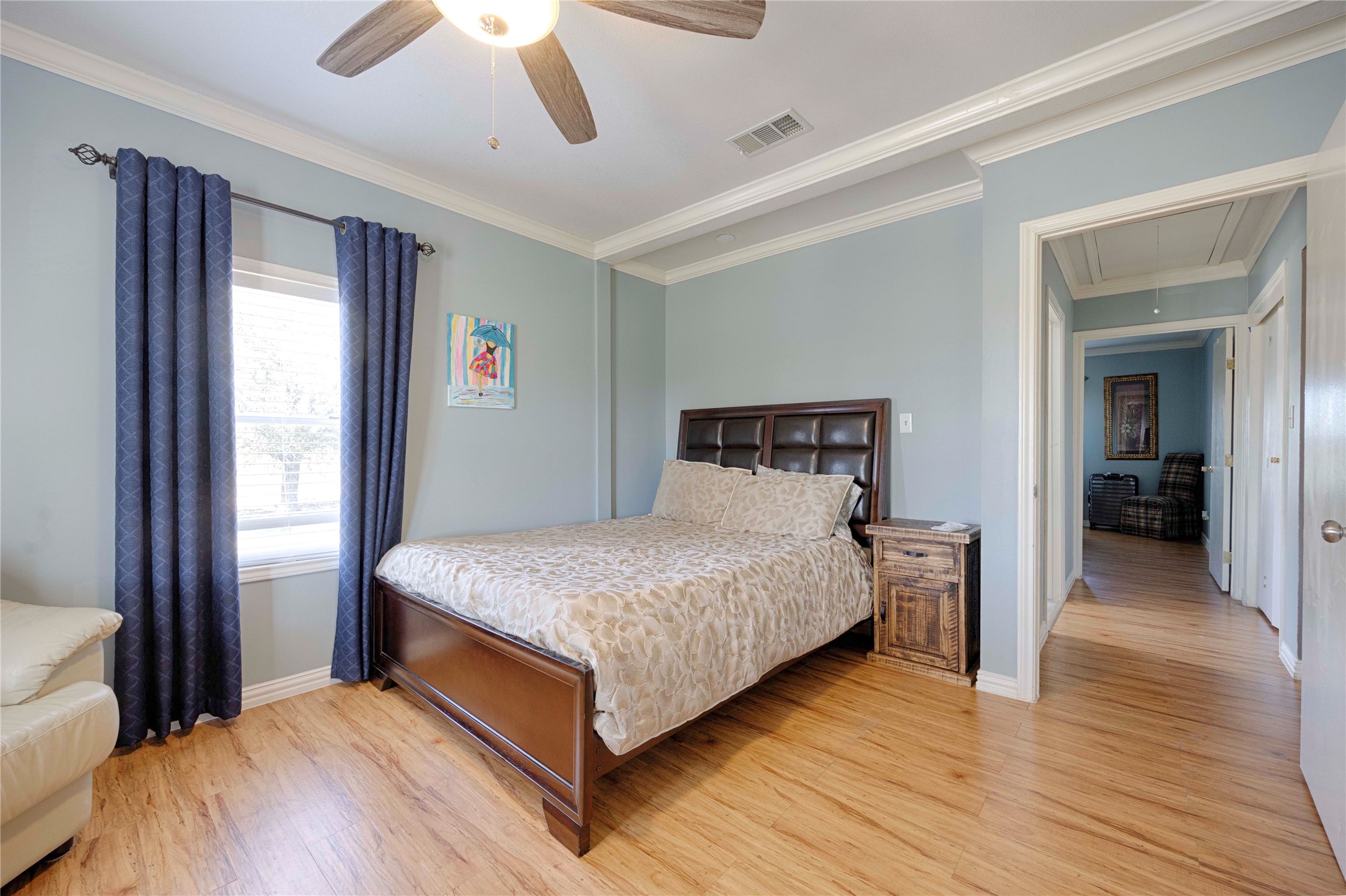 5135 Highway 90 Schulenburg, TX 78956 - Photo 20 of 32 a bedroom with a bed and a large window