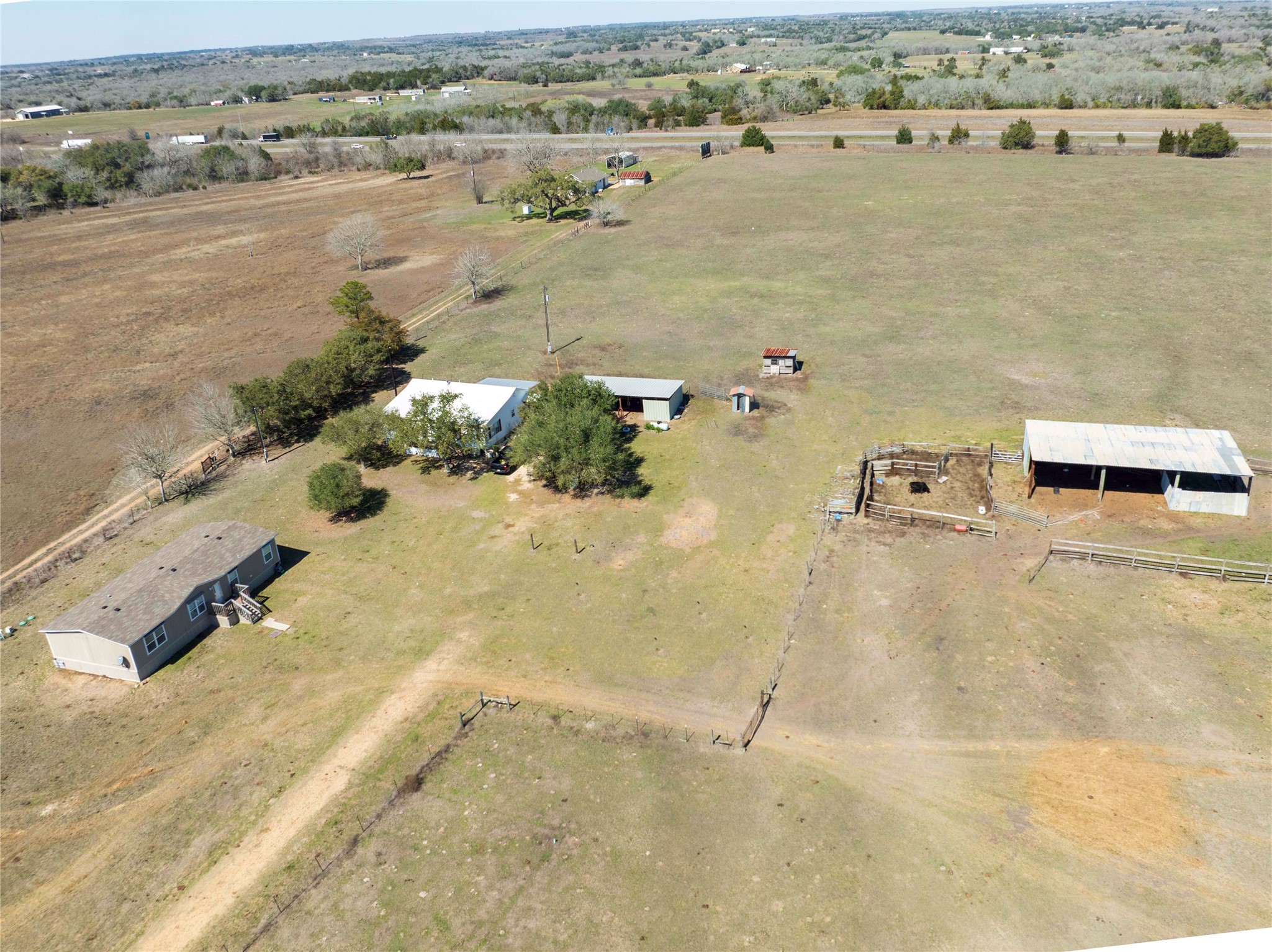 5135 Highway 90 Schulenburg, TX 78956 - Photo 2 of 32 an aerial view of residential houses with outdoor space