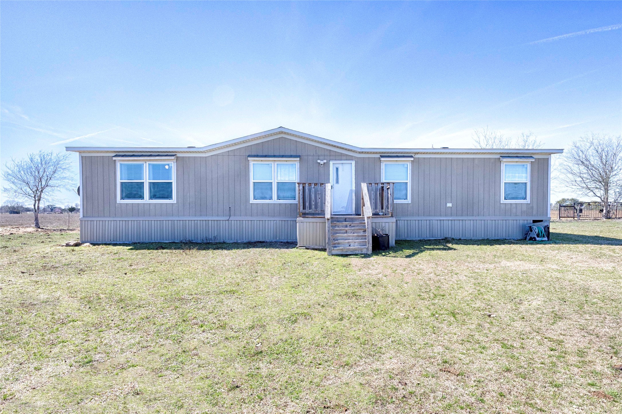5135 Highway 90 Schulenburg, TX 78956 - Photo 23 of 32 a house view with a garden space
