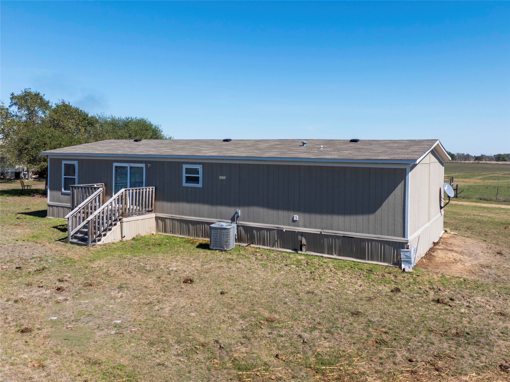 5135 Highway 90 Schulenburg, TX 78956 - Photo 24 of 32 a house view with a backyard space