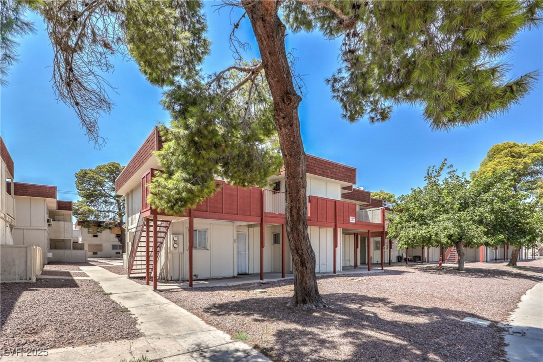 5404 South Swenson Street, Unit 34 Las Vegas, NV 89119 - Photo 25 of 28 View of front of home featuring stairs