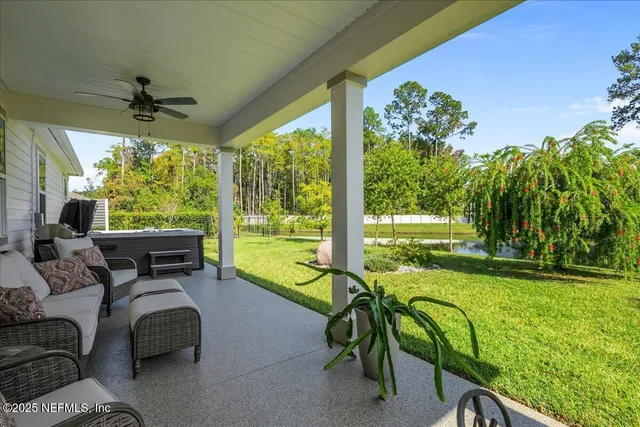a view of swimming pool and outdoor seating