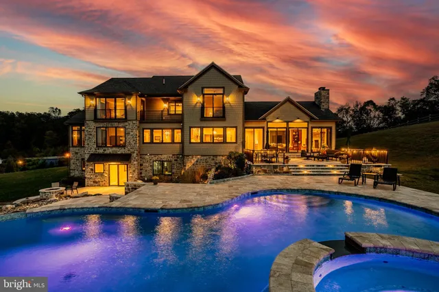 a view of swimming pool from a balcony