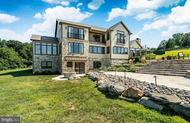 a kitchen with lots of counter top space and dining table