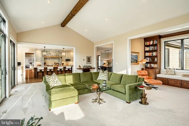 a view of a swimming pool with an outdoor seating and yard