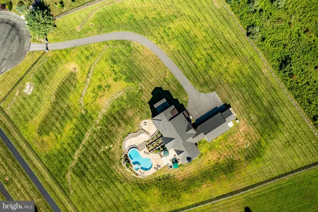 a view of a wrought iron fences in front of house