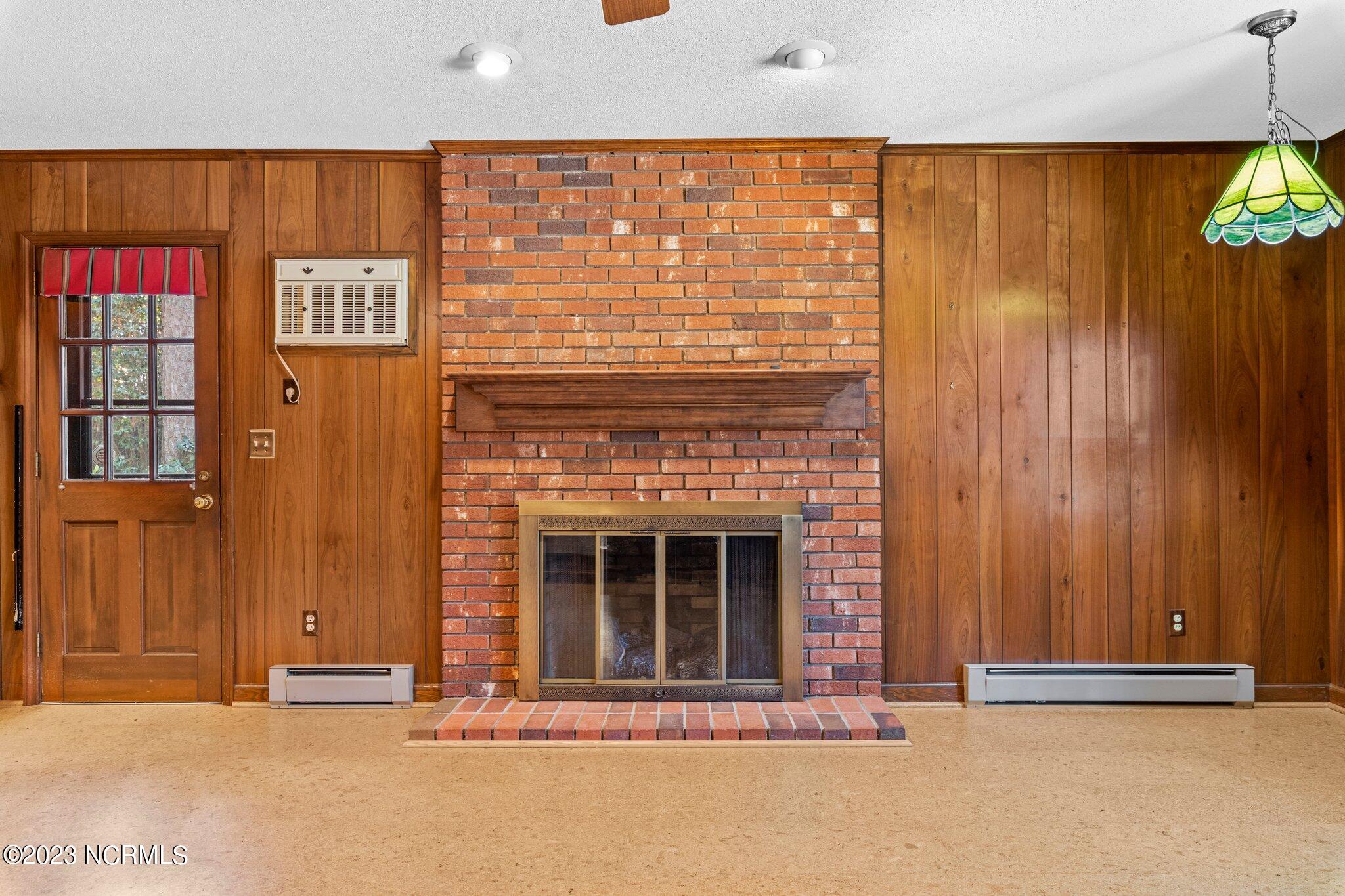 1015 Inverness Road Southern Pines, NC 28387 - Photo 20 of 53 Den Fireplace