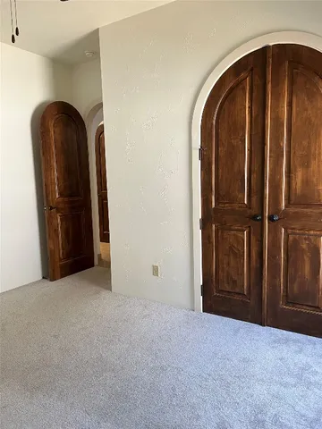 a view of empty room with windows