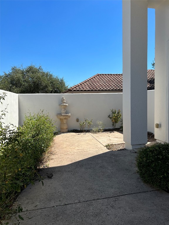 Undisclosed Address Austin, TX 78734 - Photo 18 of 21 a view of a house with a yard and potted plants