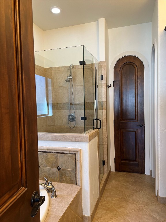 Undisclosed Address Austin, TX 78734 - Photo 6 of 21 a bathroom with a tub and shower