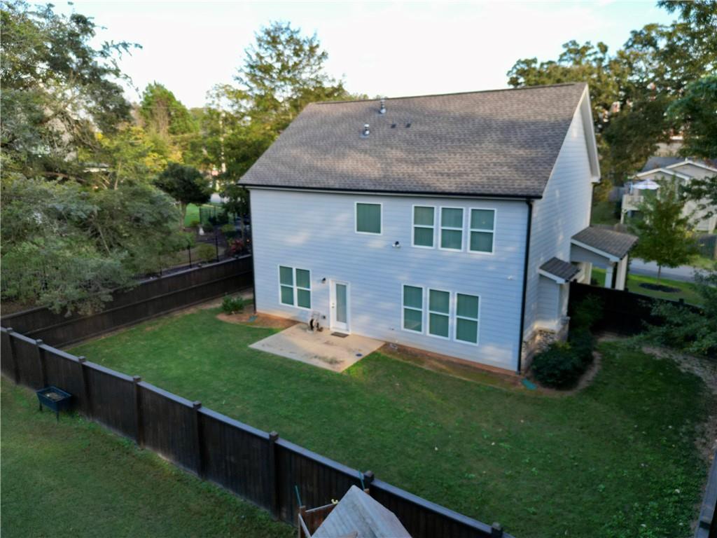619 Garner Street Buford, GA 30518 - Photo 40 of 45 a view of a house with backyard