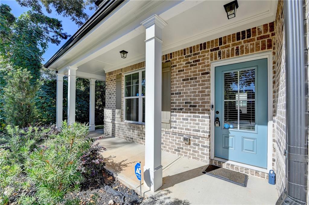 619 Garner Street Buford, GA 30518 - Photo 4 of 45 front view of a house with a glass door