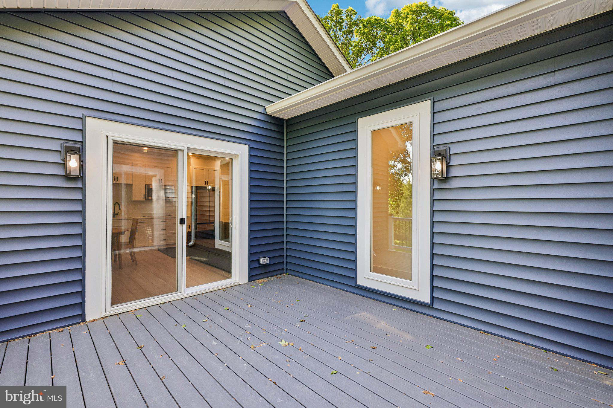 4315 Pinetree Road Rockville, MD 20853 - Photo 22 of 28 a view of a house with a deck