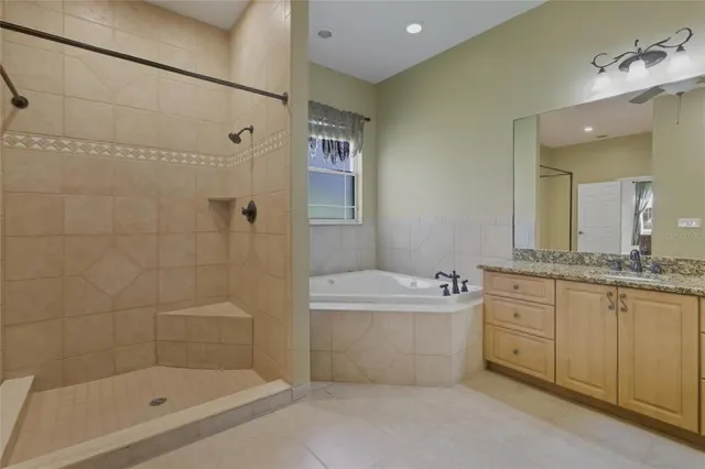 a view of kitchen with wooden floor and electronic appliances
