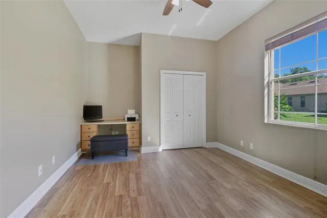 a view of room with hardwood floor