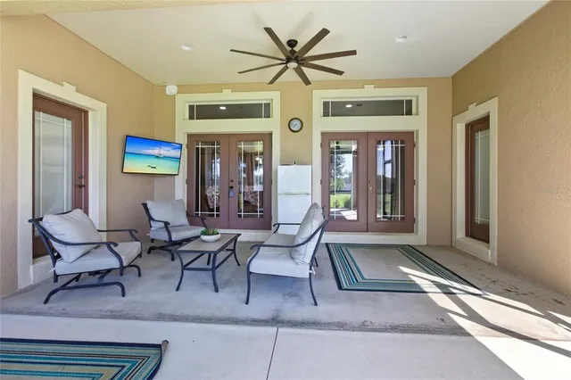 a view of a backyard with large trees