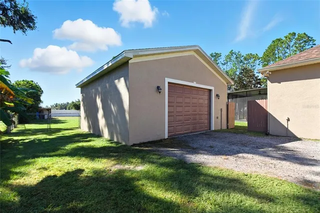 an aerial view of a house with garden