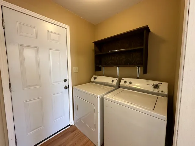 a utility room with dryer and washer