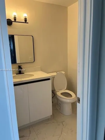 a bathroom with a sink and a toilet