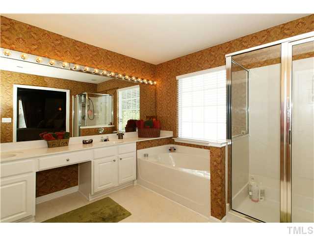 5303 Griffith Park Road Raleigh, NC 27613 - Photo 16 of 24 Large master bath with separate tub and shower. Walk-in closet and separate water closet.