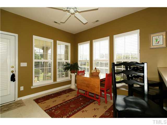 5303 Griffith Park Road Raleigh, NC 27613 - Photo 8 of 24 Plantation shutters let you enjoy the outdoors while you sip your morning coffee.