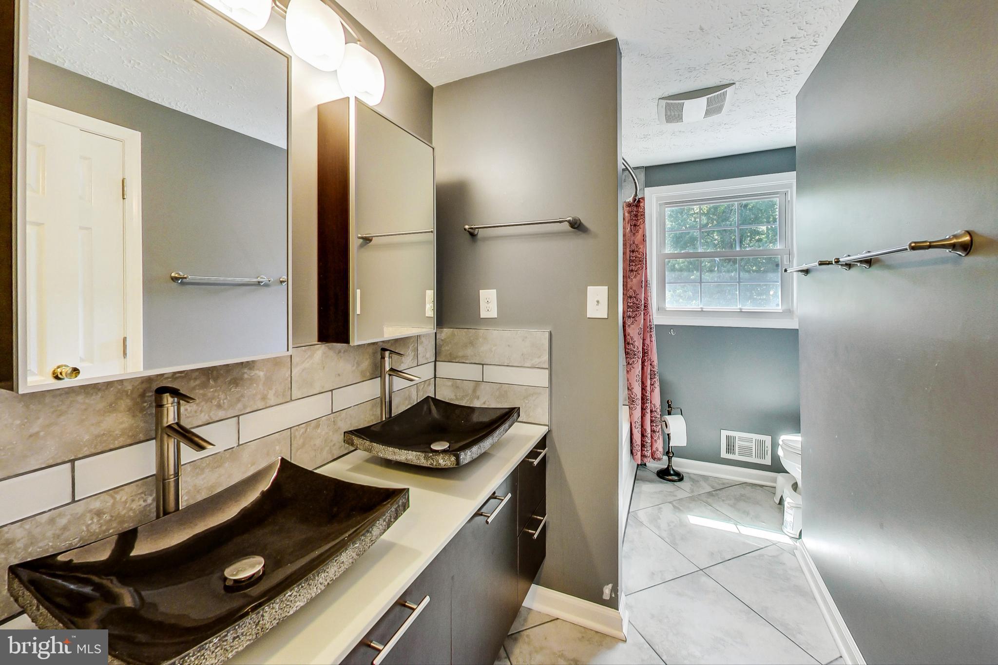 9226 Briarchip Street Laurel, MD 20708 - Photo 38 of 66 hall bathroom