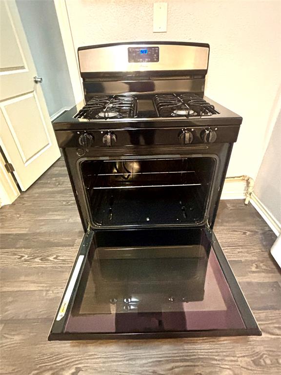 905 Isbell Road Fort Worth, TX 76114 - Photo 20 of 30 a stove top oven sitting inside of a kitchen