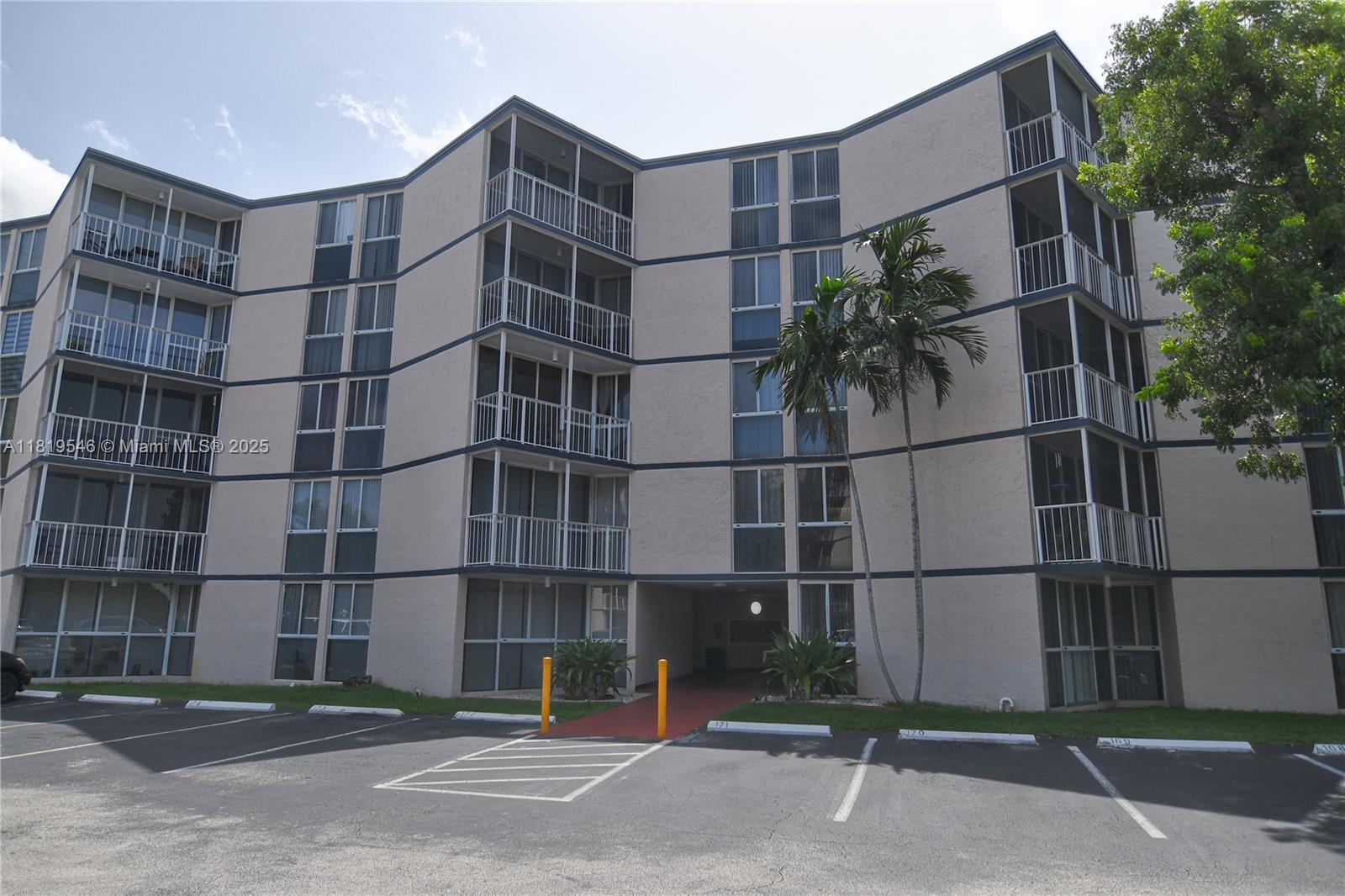 7125 Northwest 186th Street, Unit B311 Hialeah, FL 33015 - Photo 1 of 31 a building view