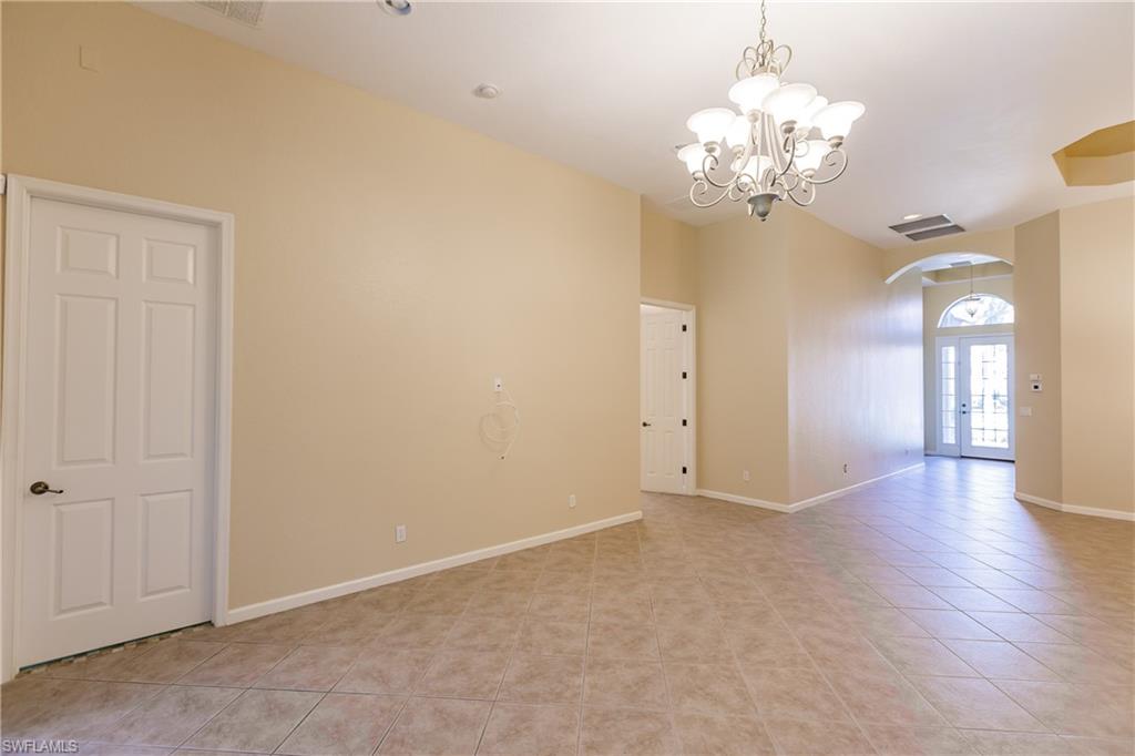 7868 Founders Circle Naples, FL 34104 - Photo 2 of 28 a view of a chandelier in a room