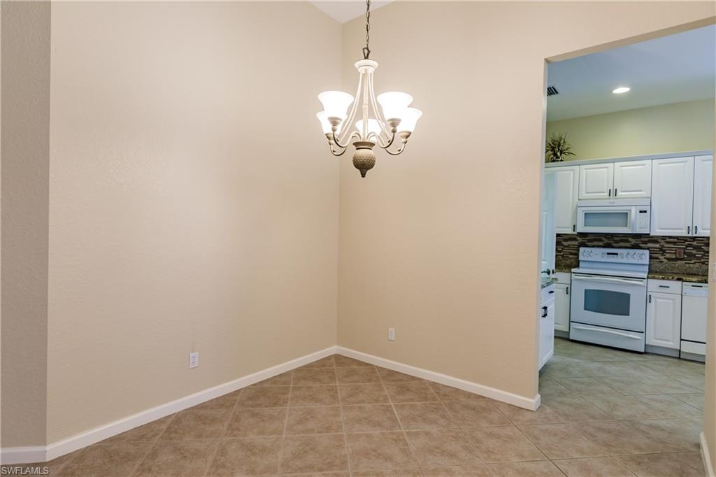 7868 Founders Circle Naples, FL 34104 - Photo 28 of 28 a view of a kitchen with a sink