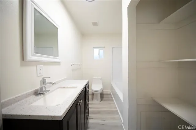 a bathroom with a sink and a toilet