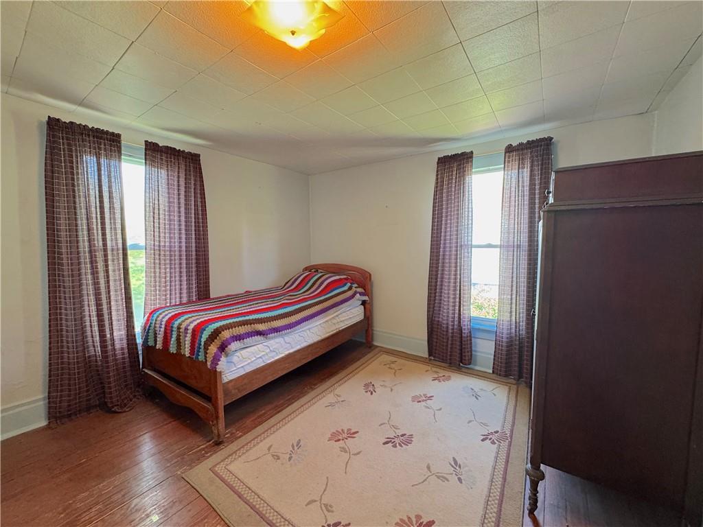 3003 Riverside Drive Claridge, PA 15623 - Photo 25 of 28 a bedroom with a bed and a window