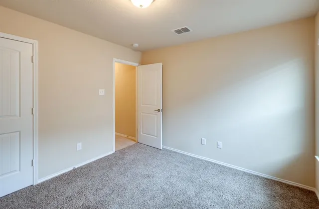 an empty room with an entryway