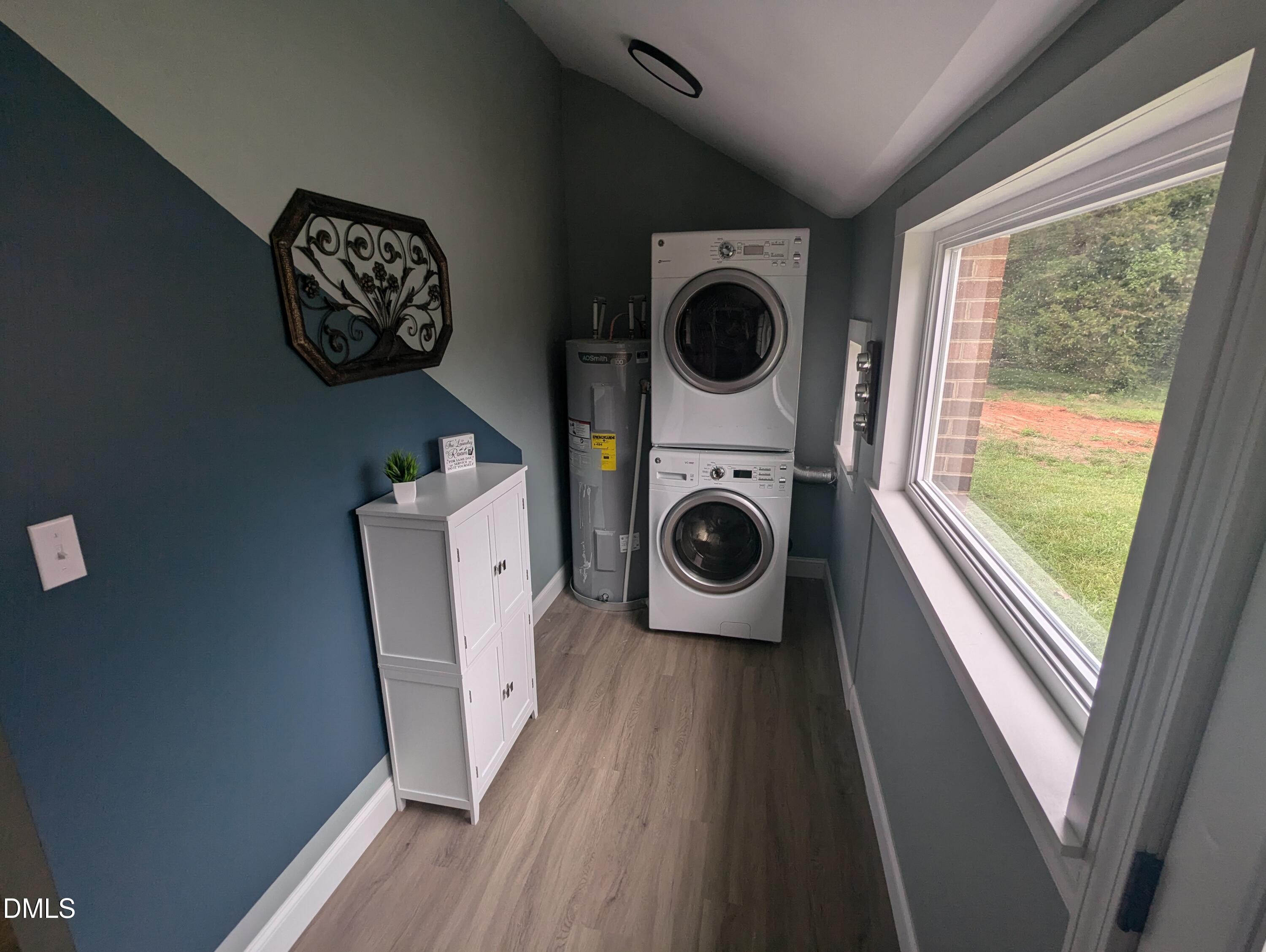 210 Grapevine Drive Roxboro, NC 27574 - Photo 16 of 31 a view of washer and dryer in a utility room