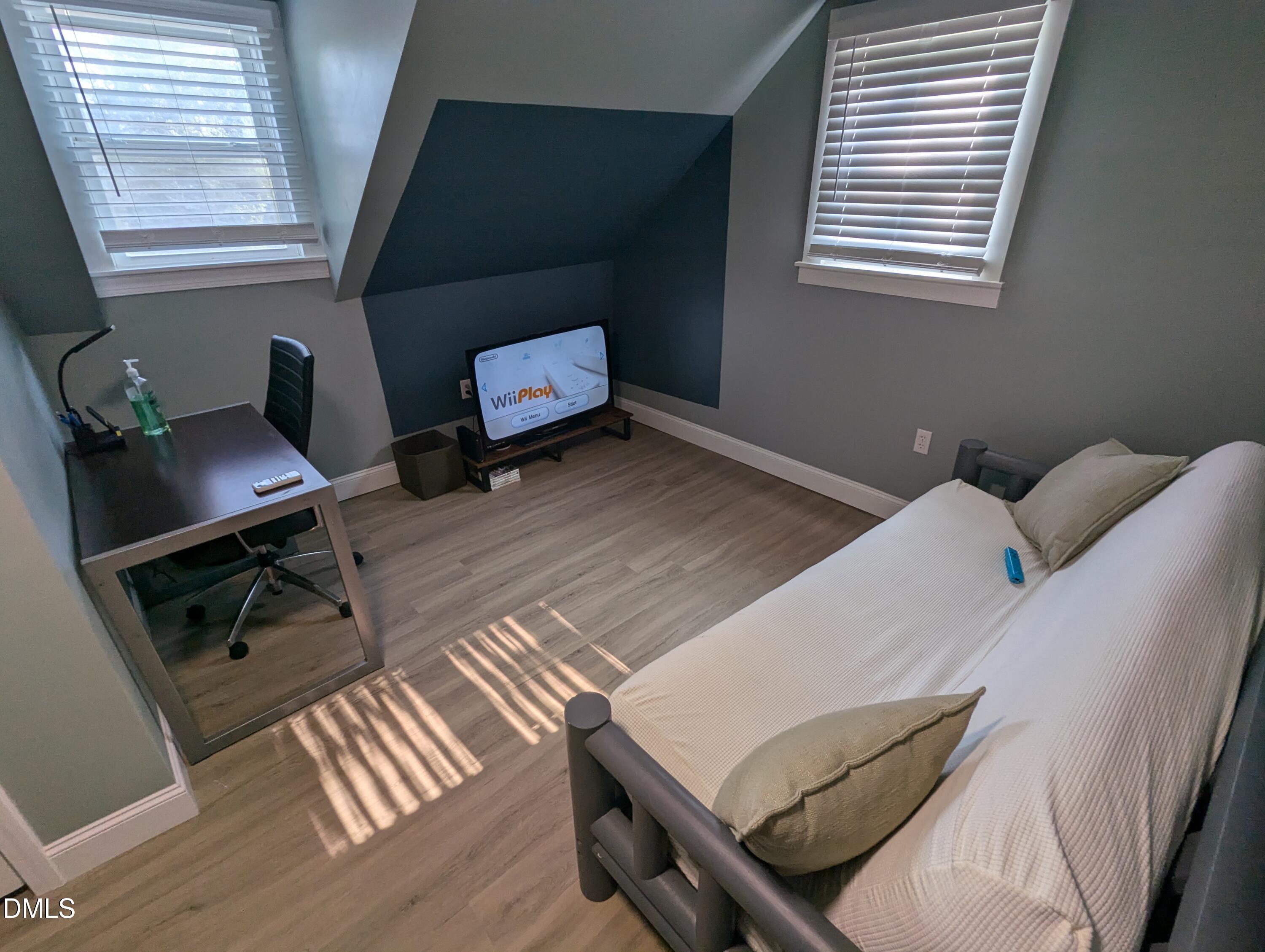 210 Grapevine Drive Roxboro, NC 27574 - Photo 19 of 31 a bedroom with a bed and a window