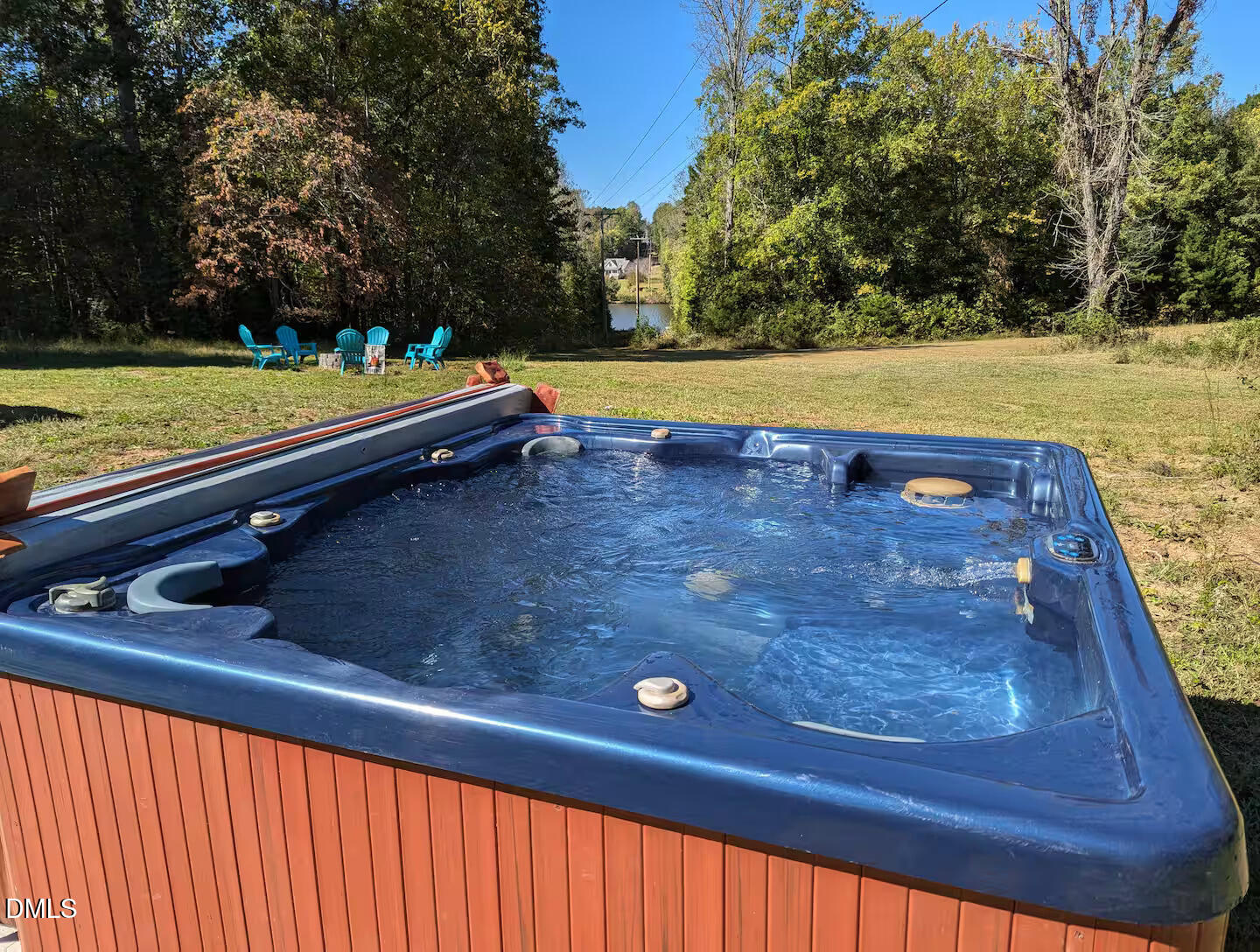 210 Grapevine Drive Roxboro, NC 27574 - Photo 21 of 31 a view of a swimming pool with a yard