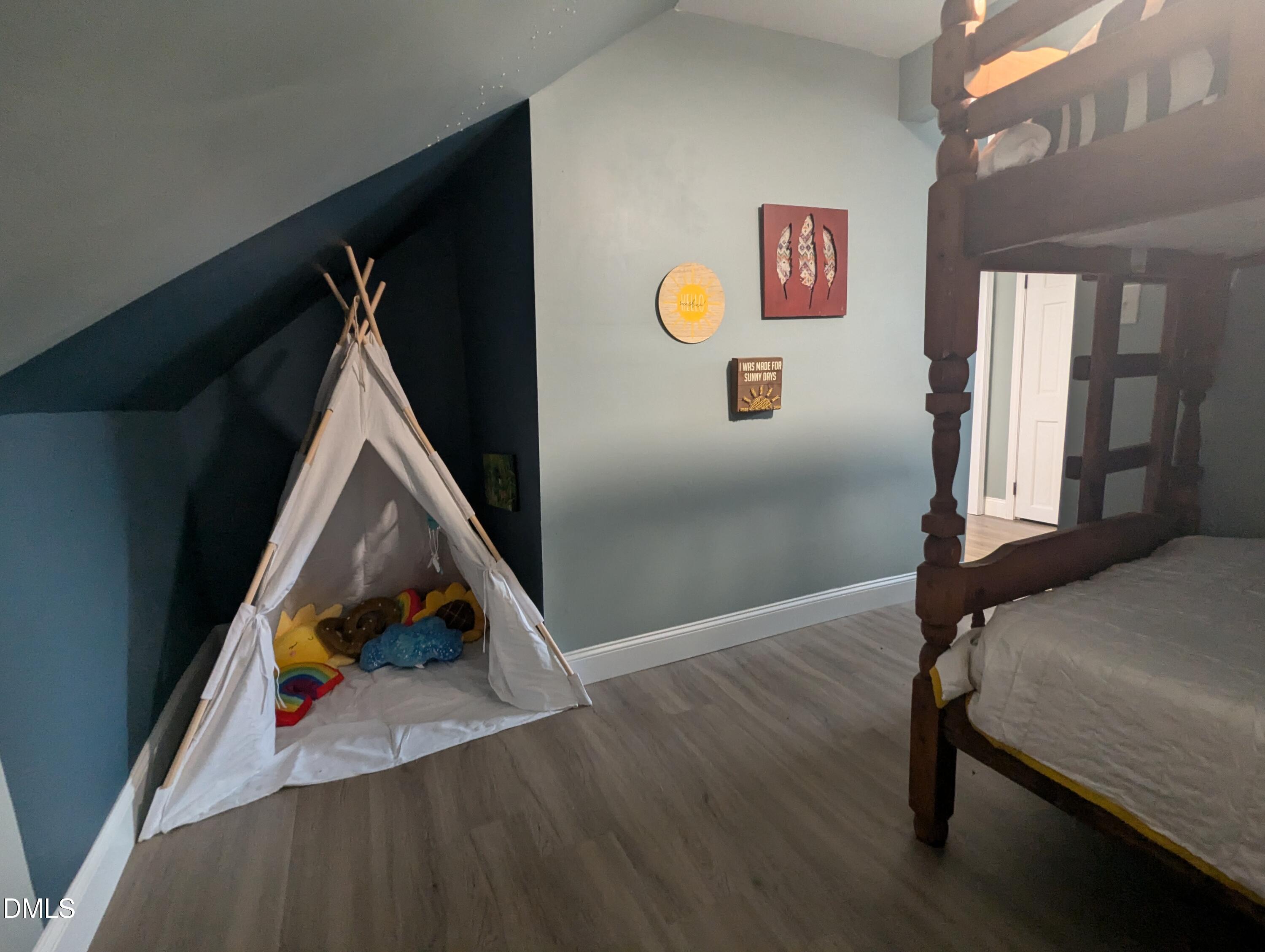 210 Grapevine Drive Roxboro, NC 27574 - Photo 7 of 31 a view of entryway and hall with wooden floor